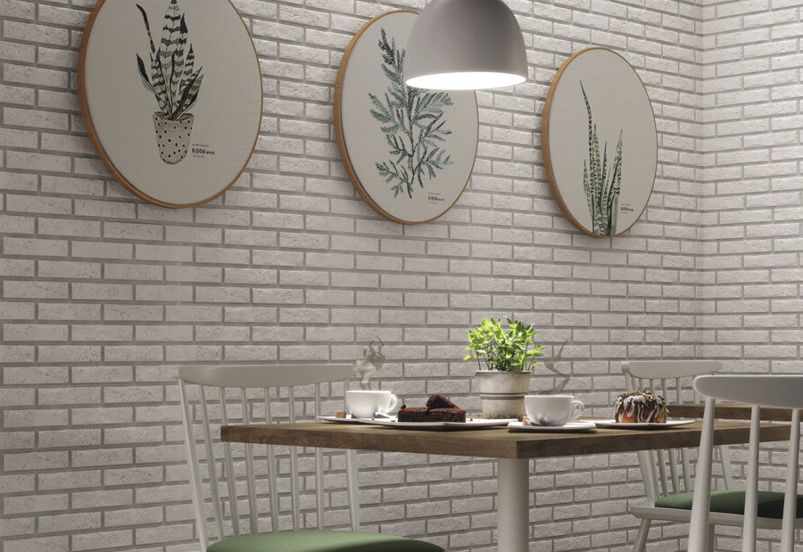 białe płytki imitujące cegłę na ścianie w kuchni